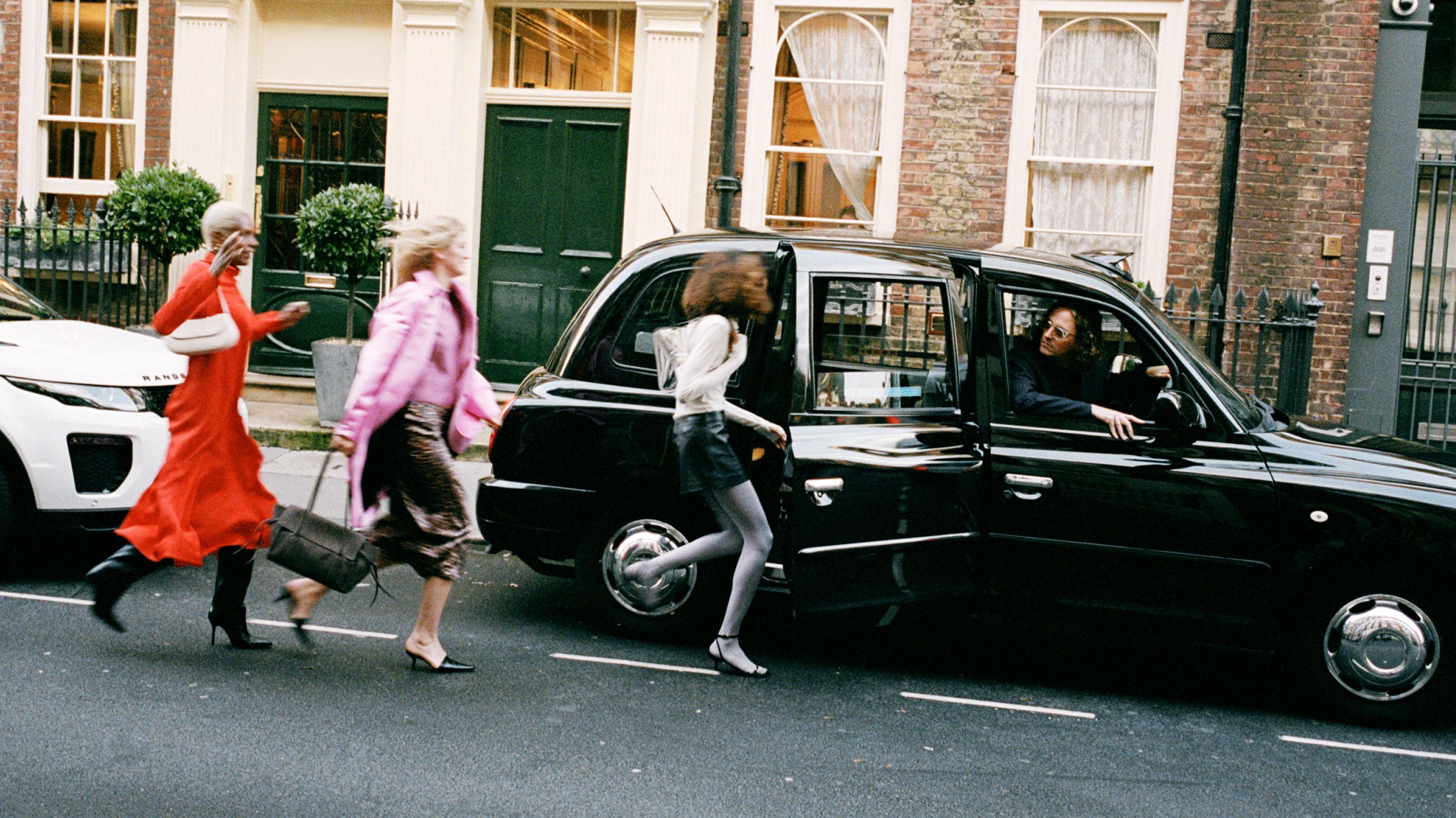 Three models walking to a taxi wearing the Mulberry Clovelly, Soft Bayswater and Lana Shoulder bag