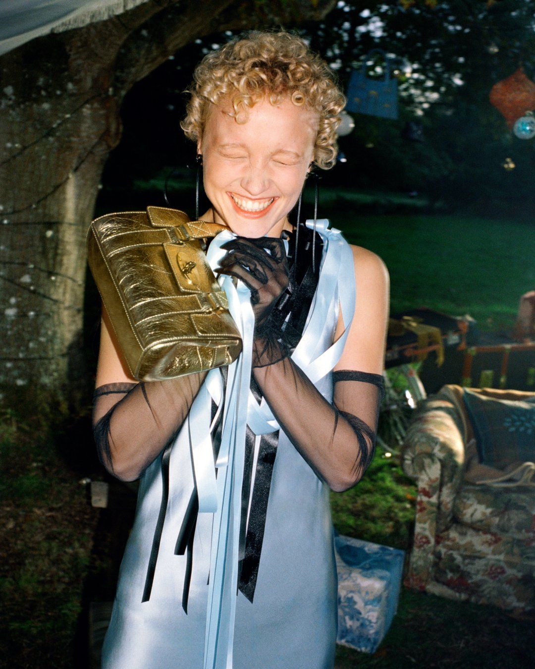 Girl holding Mini Bayswater Gold