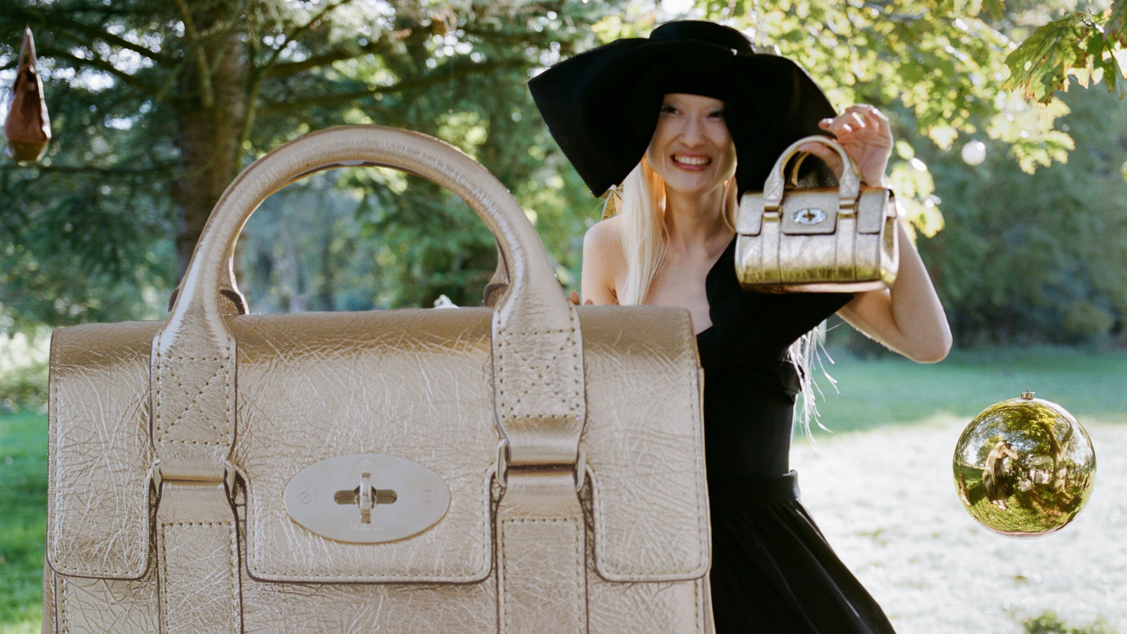 ModelwithLargeandMiniGoldBayswater