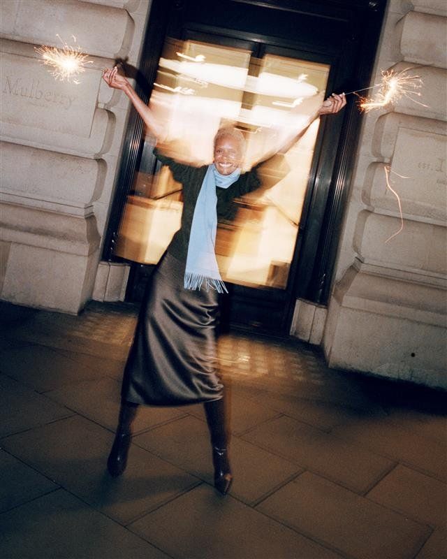 Model wearing Mulberry scarf in Blue