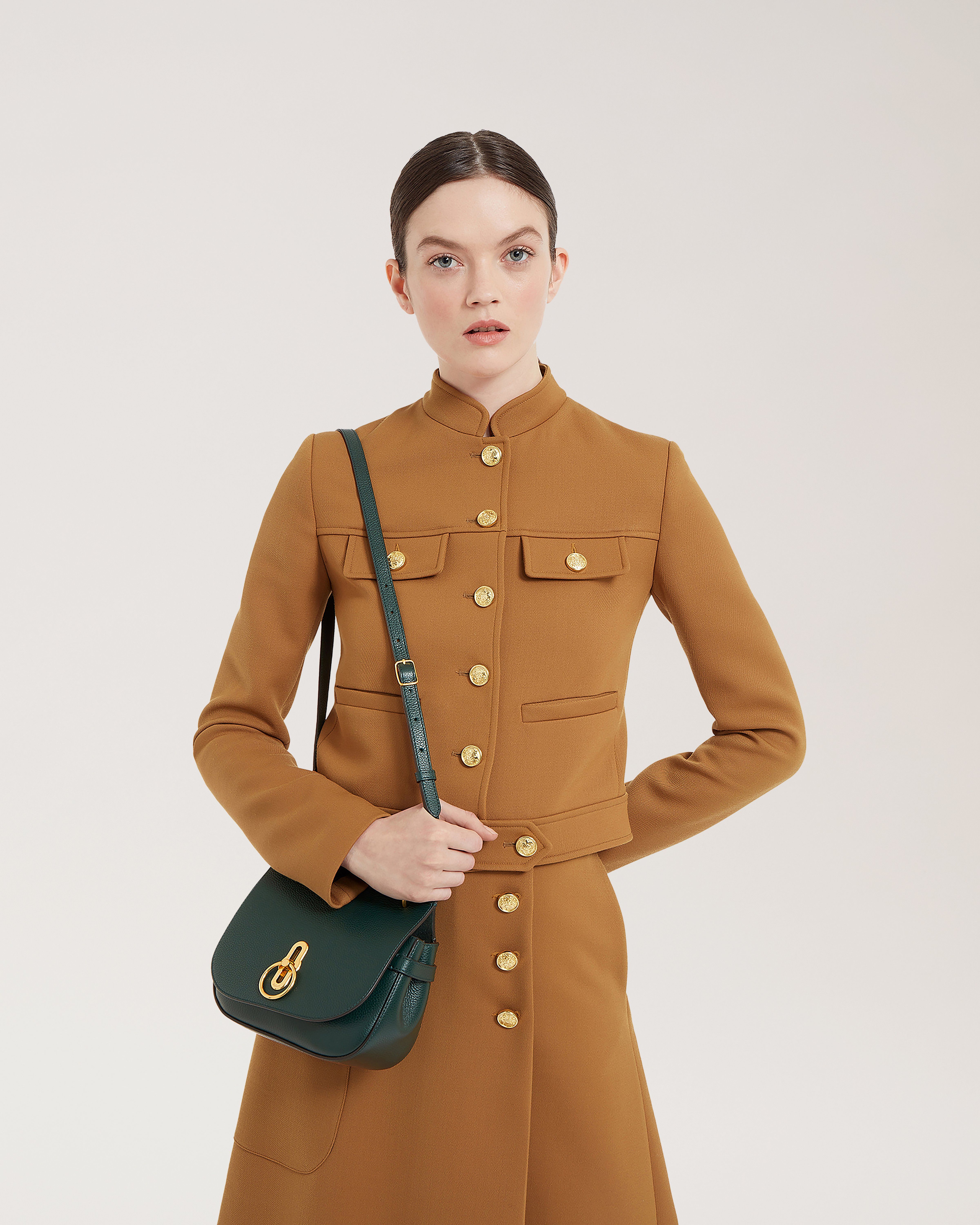 Model wearing Small Amberley Satchel in Mulberry Green Small Classic Grain