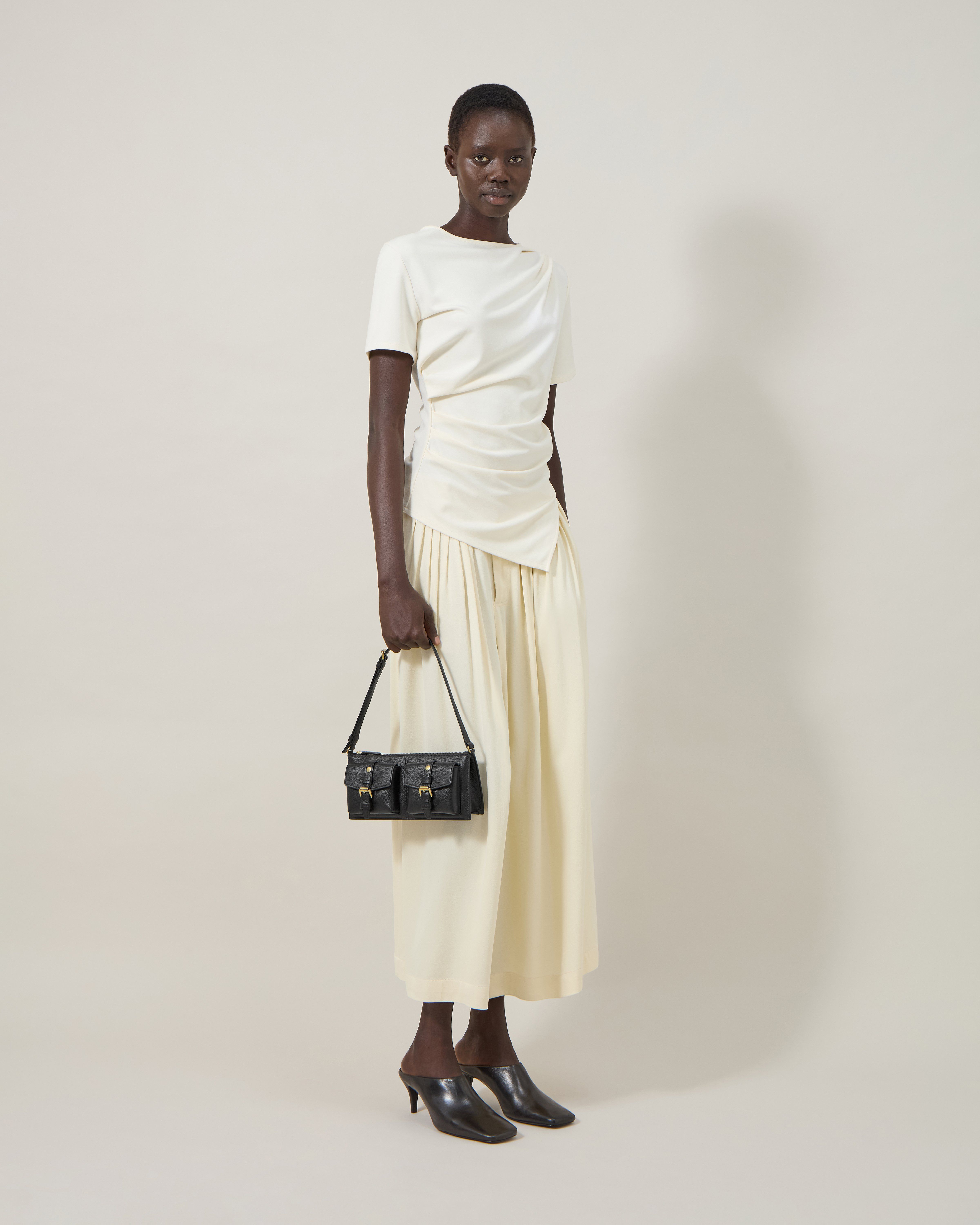 Model Holding Mini Roxanne Shoulder Bag Black