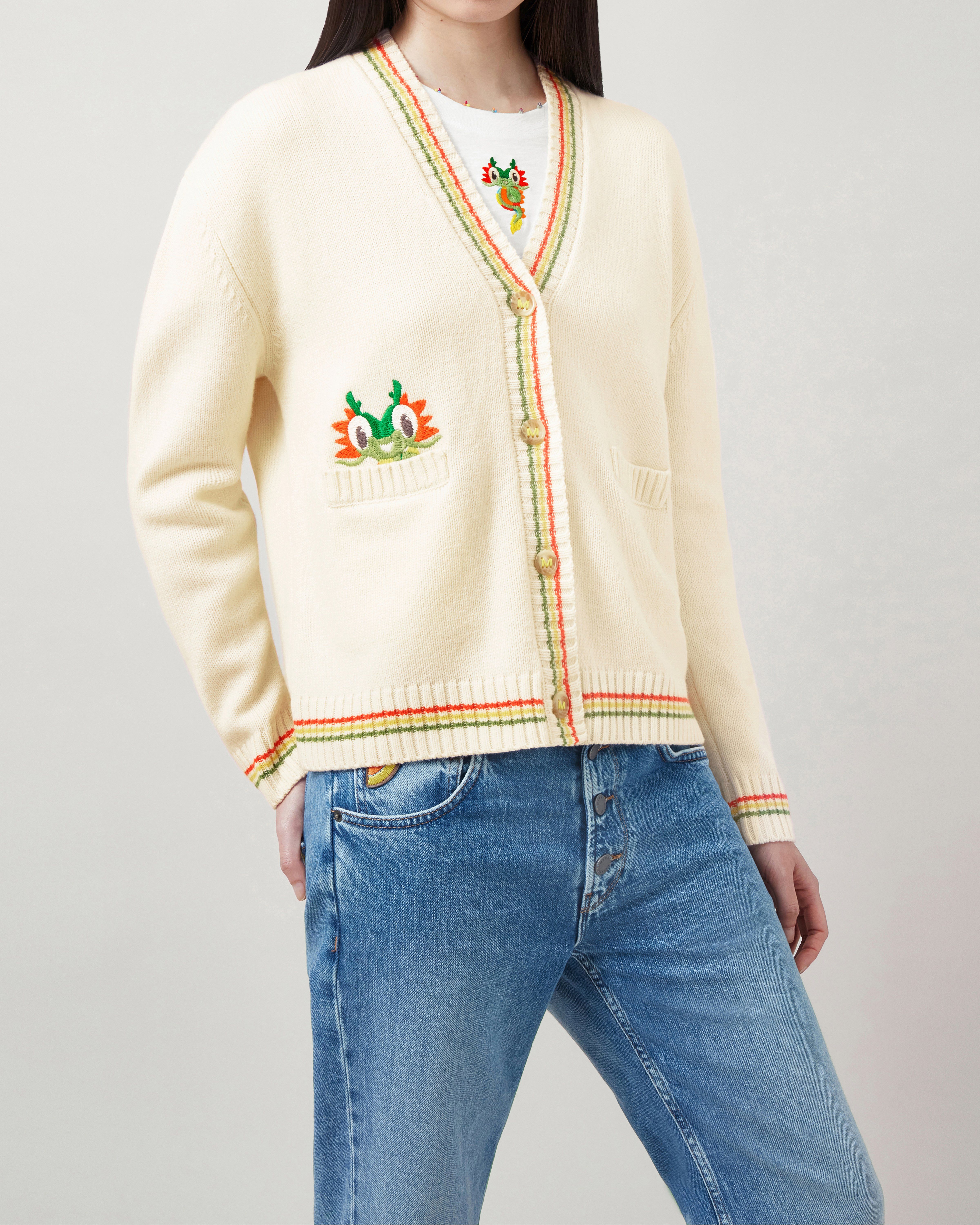 Model wearing Mulberry x Mira Mikati embroidered dragon cardigan white