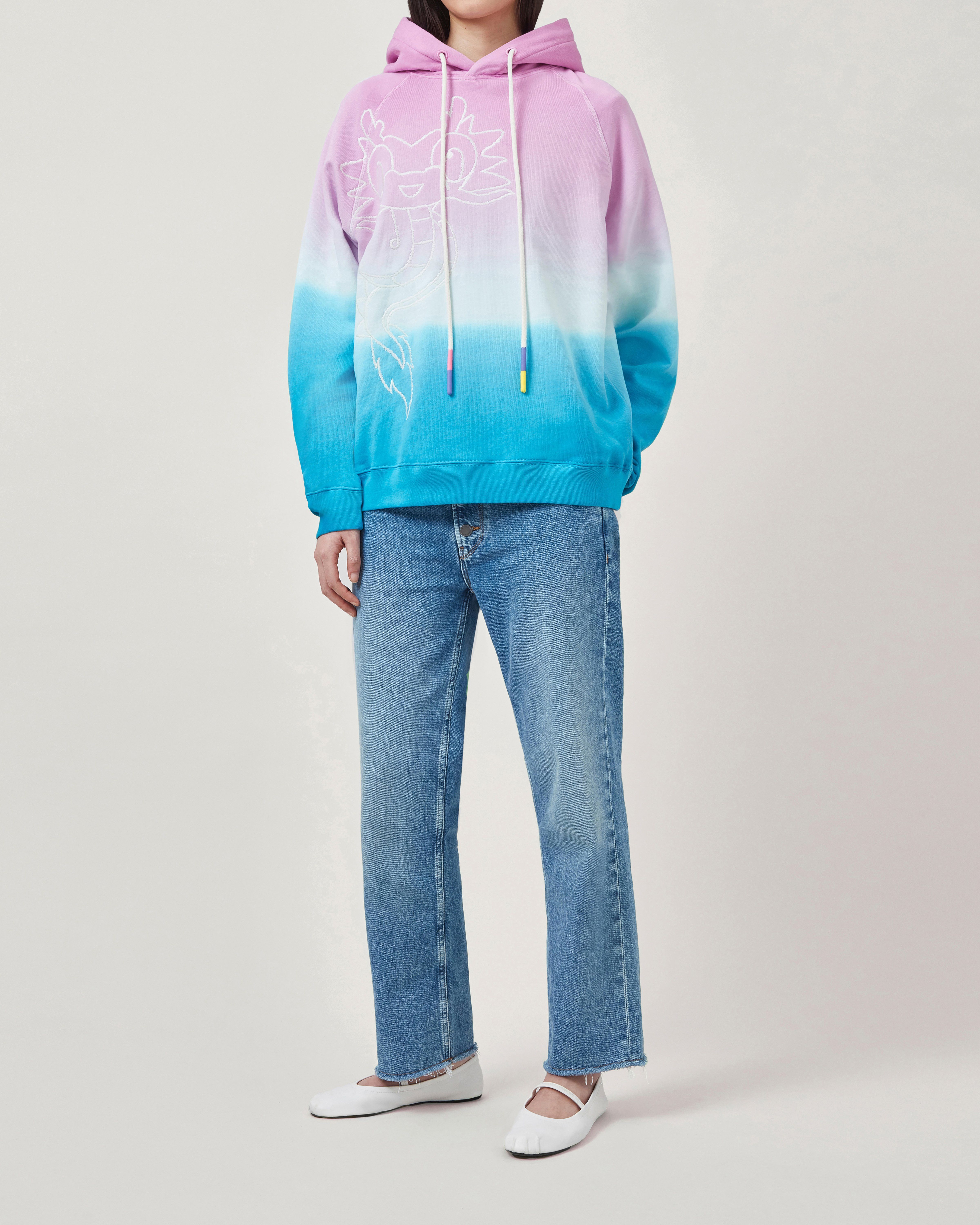 Model wearing Mulberry x Mira Mikati Printed Gradient Hoodie Pink & Blue Cotton