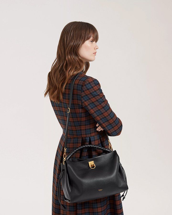 Model wearing the Mulberry Iris bag in black