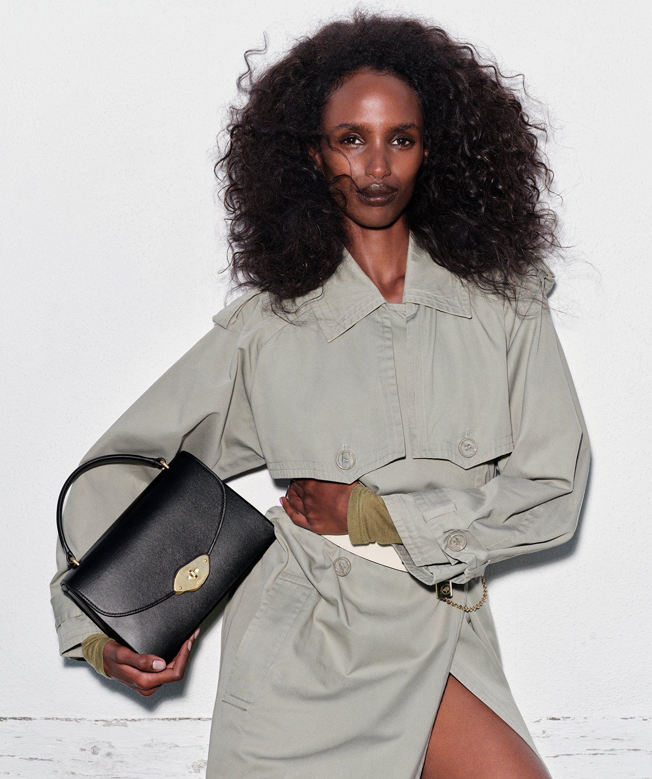 Model wearing Mulberry Lana Top Handle bag in black