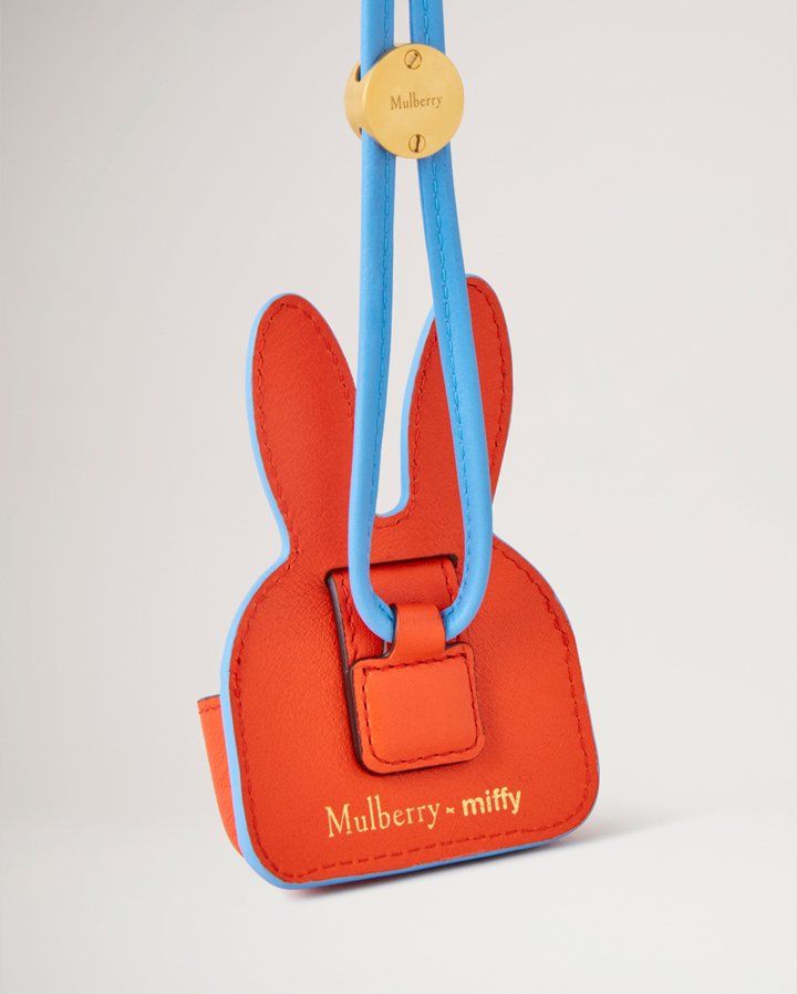 랜야드가 있는 주황색 mulberry miffy 에어팟 케이스