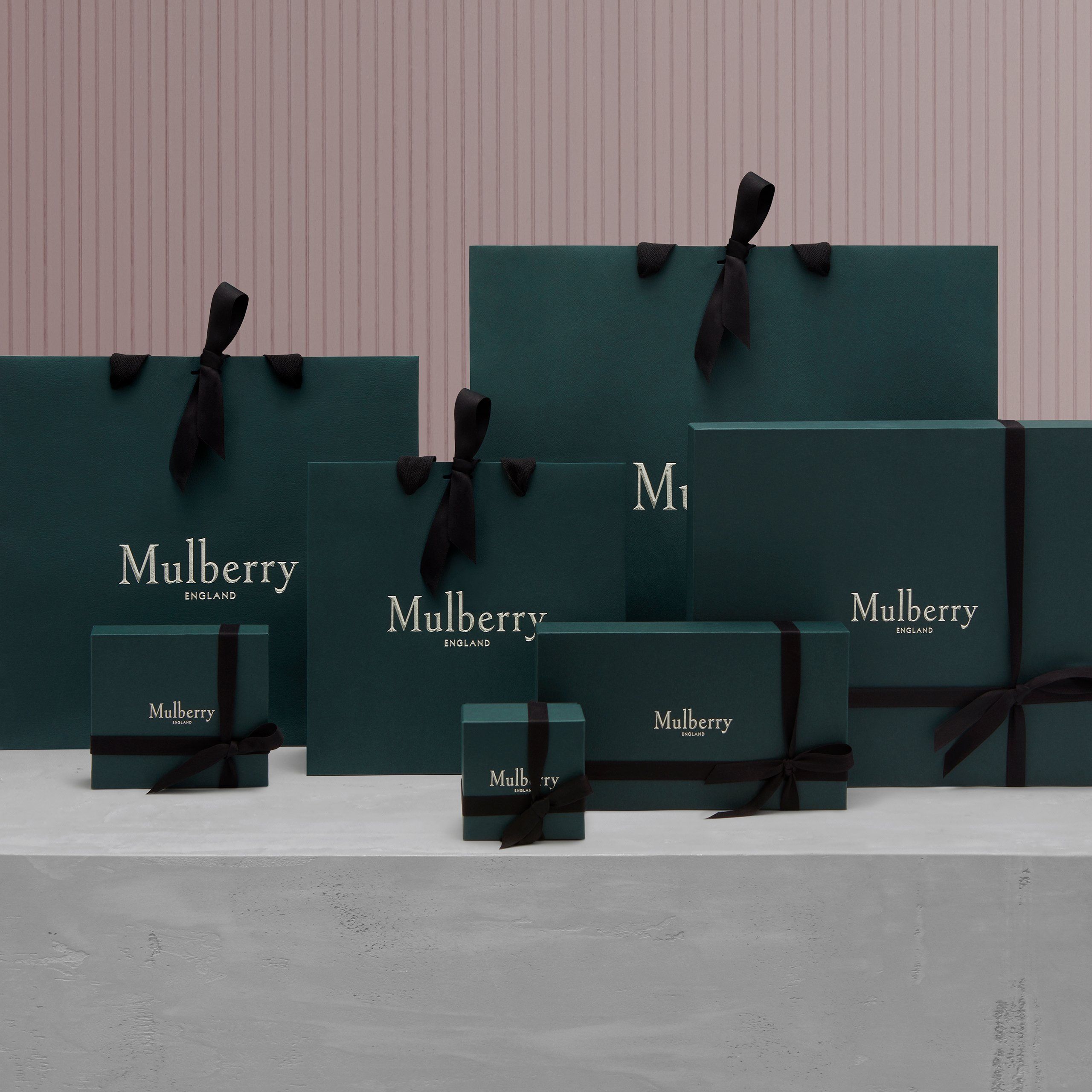 Mulberry green packaging bags with purple bow