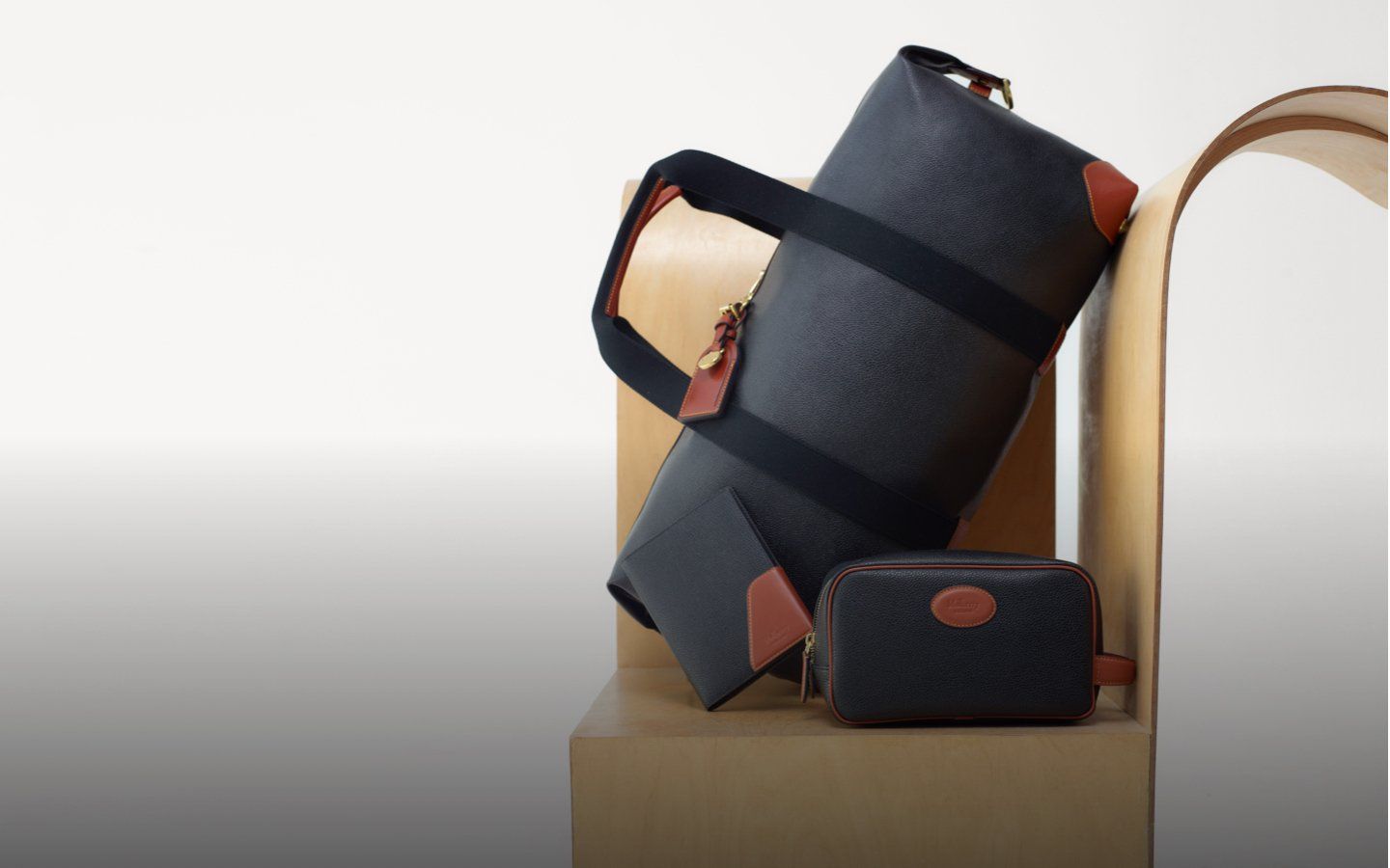 mulberry clipper bag, passport cover and wash case in black-cognac
