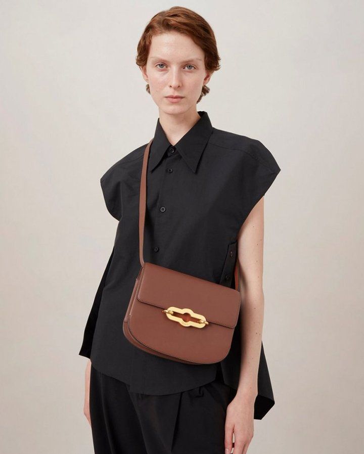 Model wearing the Mulberry Pimlico Satchel in Bright Oak Super Lux Calf leather