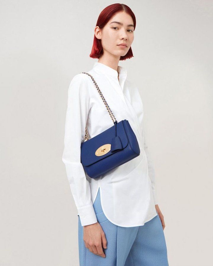 Model wearing the Mulberry Lily handbag  in Pigment Blue