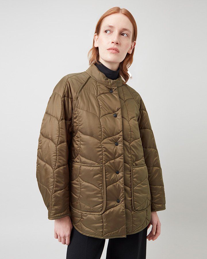 Model wearing the Softie Quilted Shell Jacket in Tobacco Brown Recycled Nylon