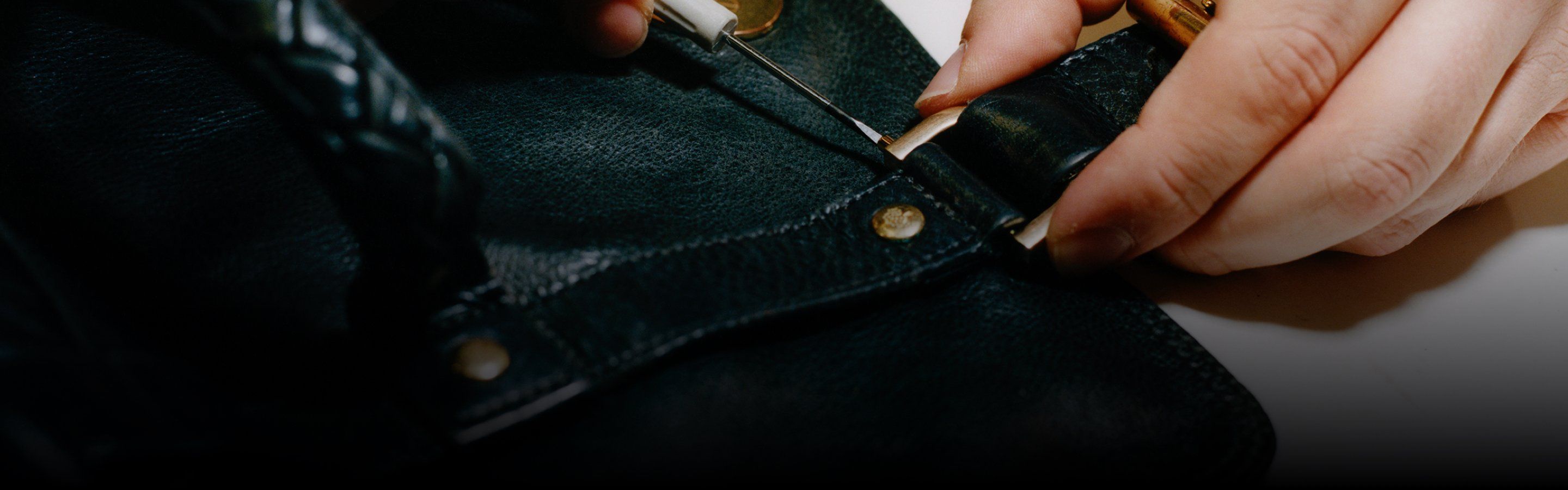 Black Mulberry handbag being repaired