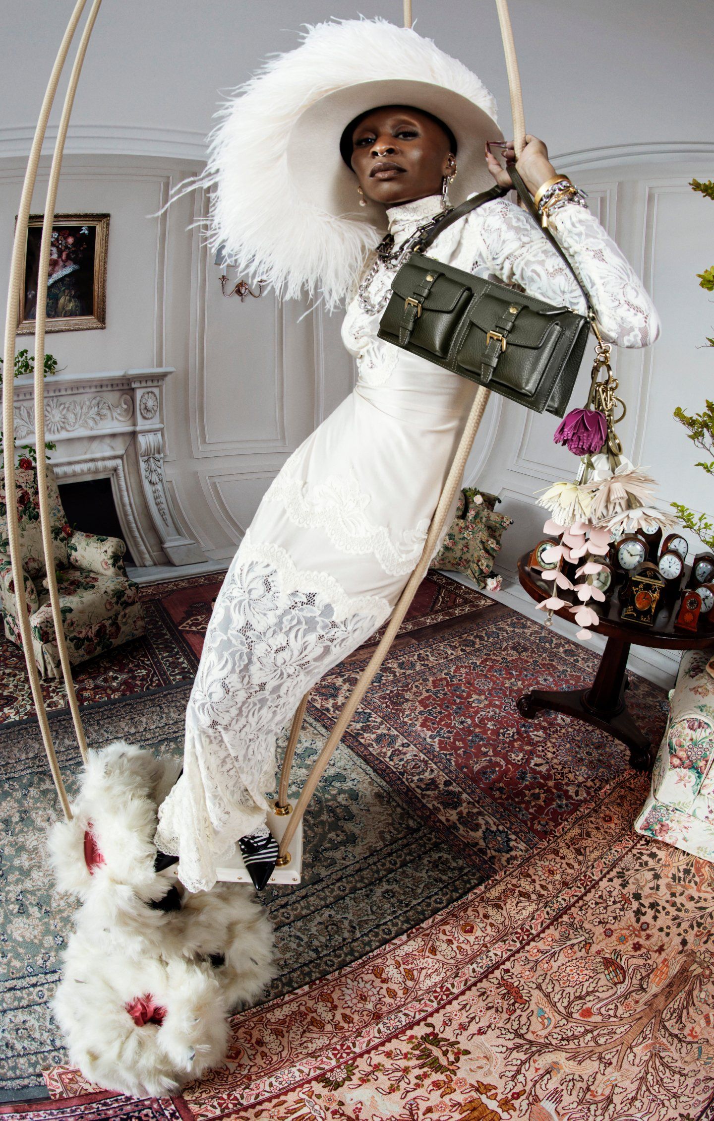 female model wearing Mulberry mini roxanne shoulder bag in sage green