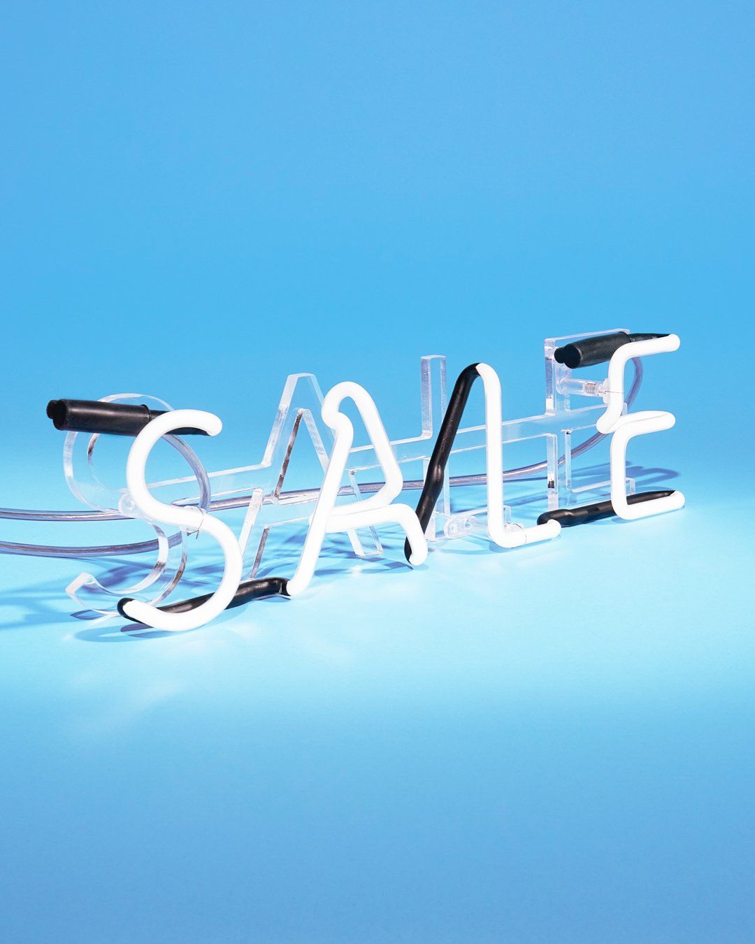 mulberry sale sign in neon letters