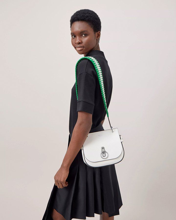 Model wearing Small Amberley Satchel in White Small Classic Grain