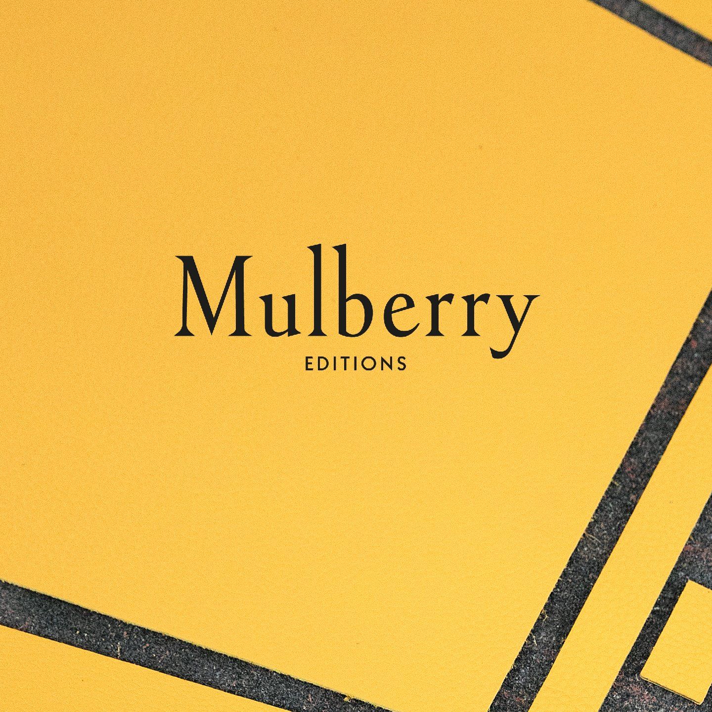 mulberry logo on yellow background