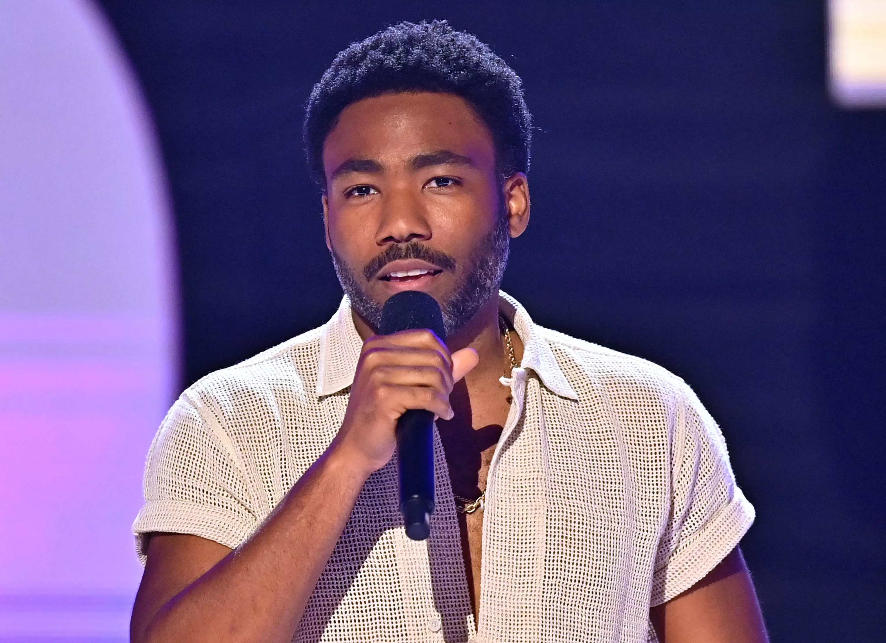 New Music Friday: Listen To New Releases From Childish Gambino, JT, Rauw Alejandro & More