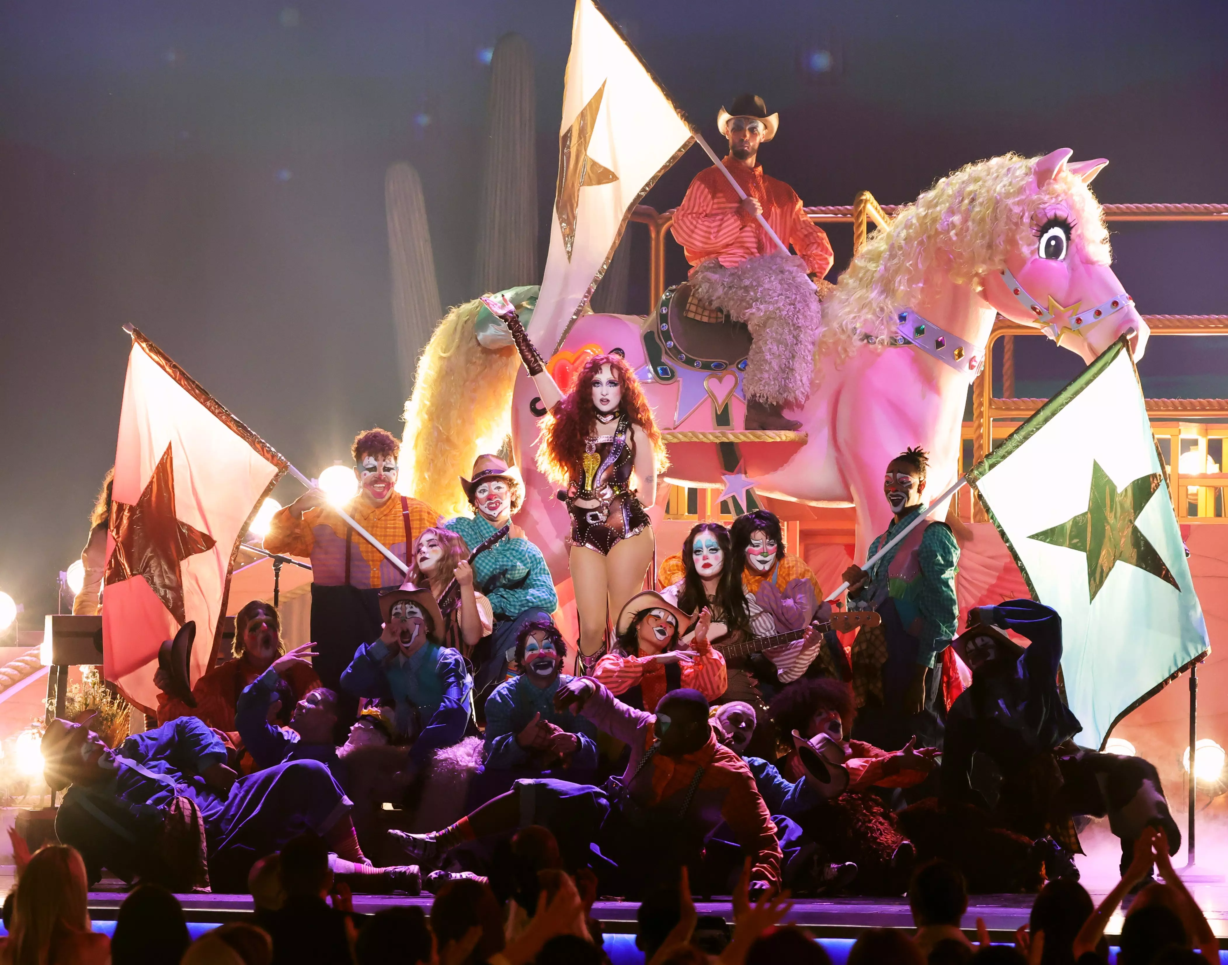 2025 GRAMMYs: Chappell Roan Sings "Pink Pony Club" In Colorful, Clowning Debut Performance