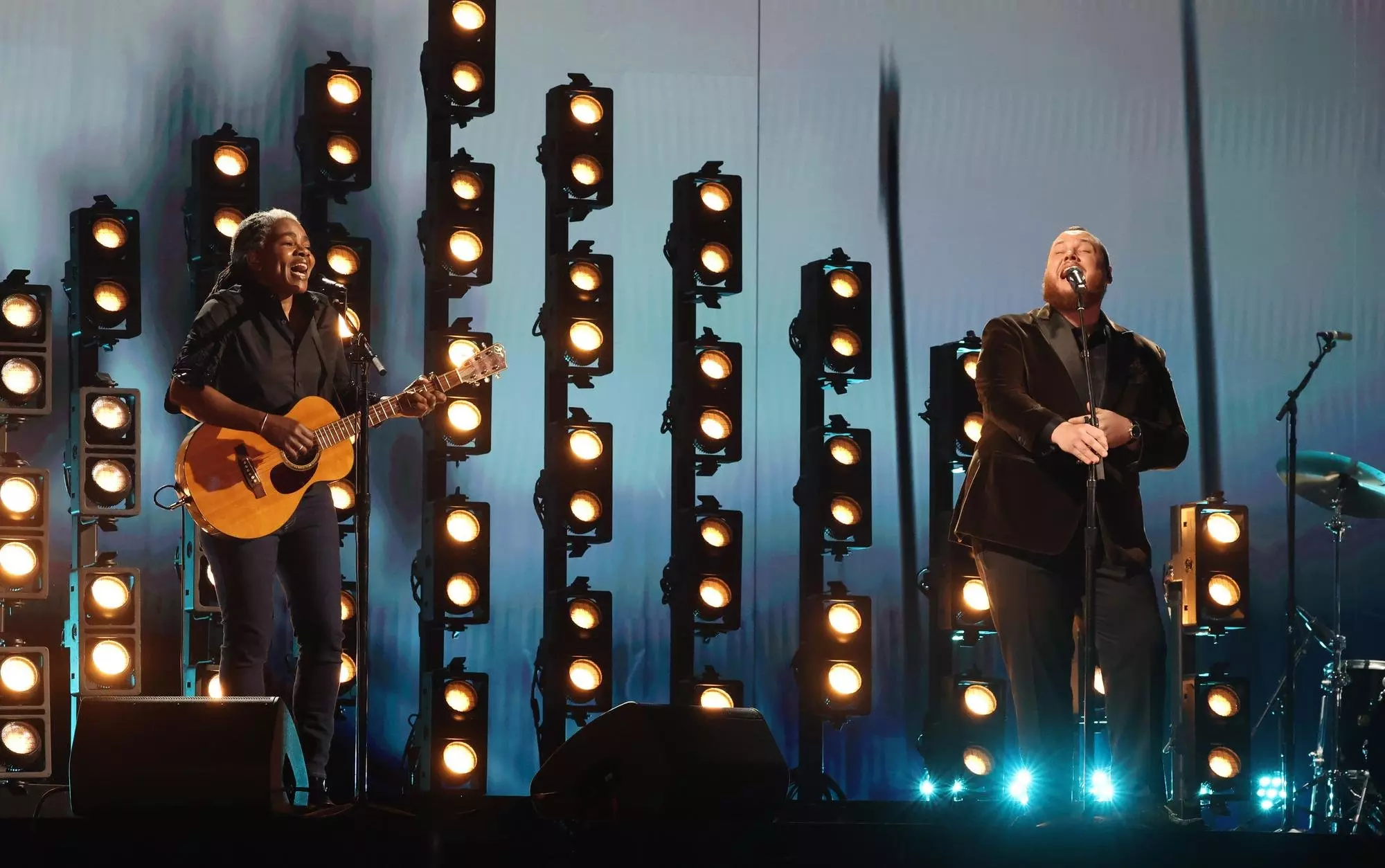 Luke Combs and Tracy Chapman performing at the 66th GRAMMY Awards