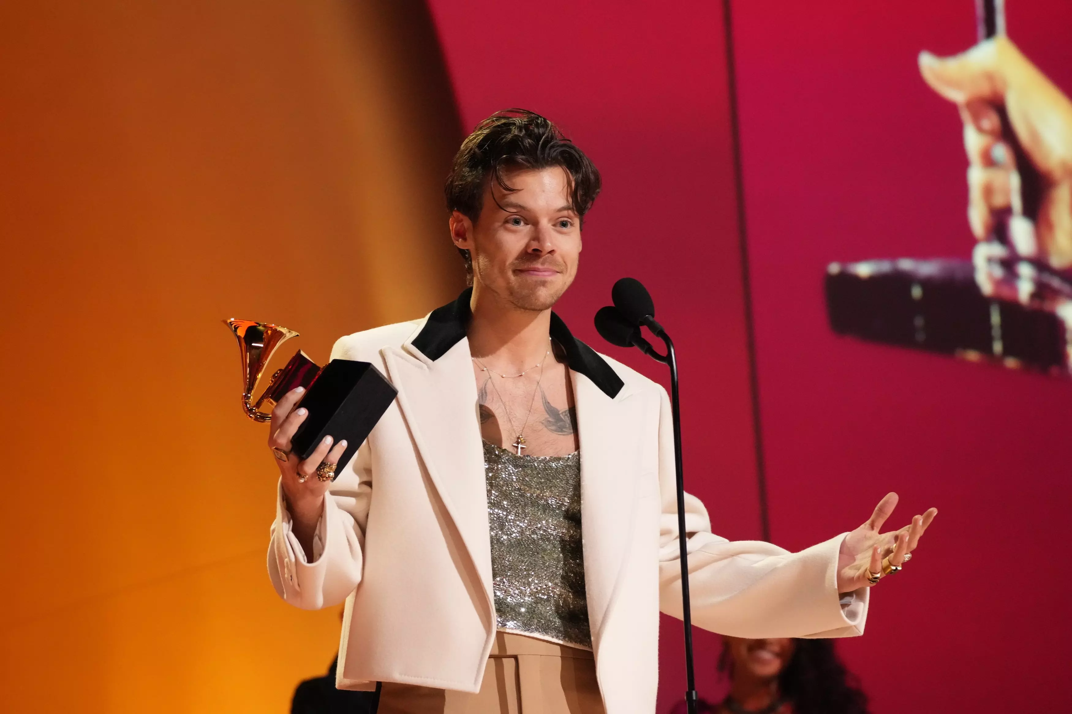 Harry Styles accepting a GRAMMY Award