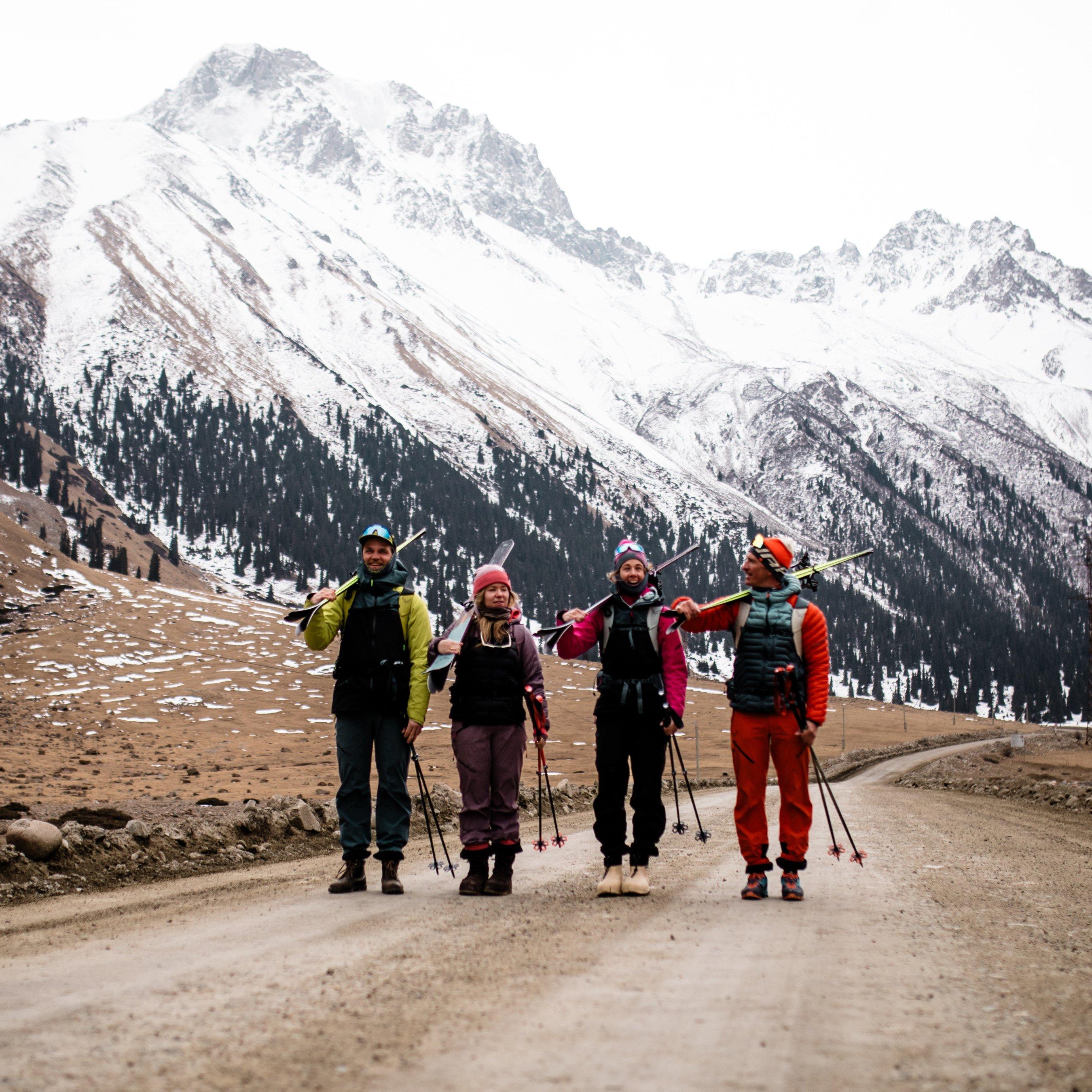 Friends on their way skitouring