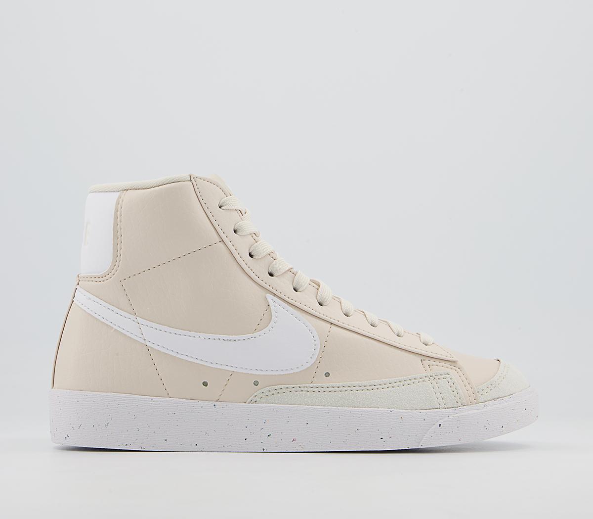 white and brown nike blazers