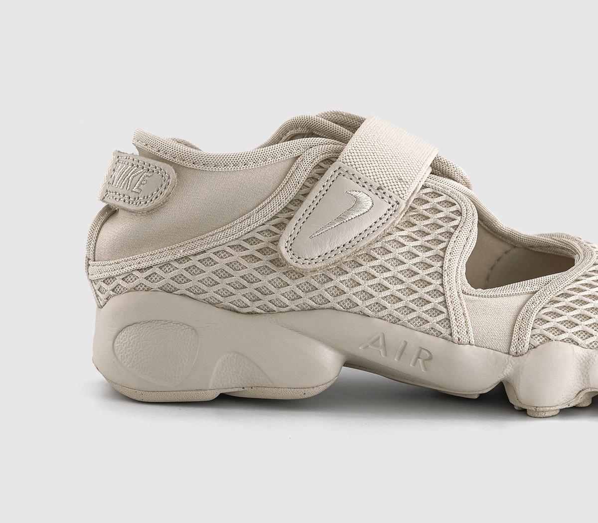 white nike rifts infants