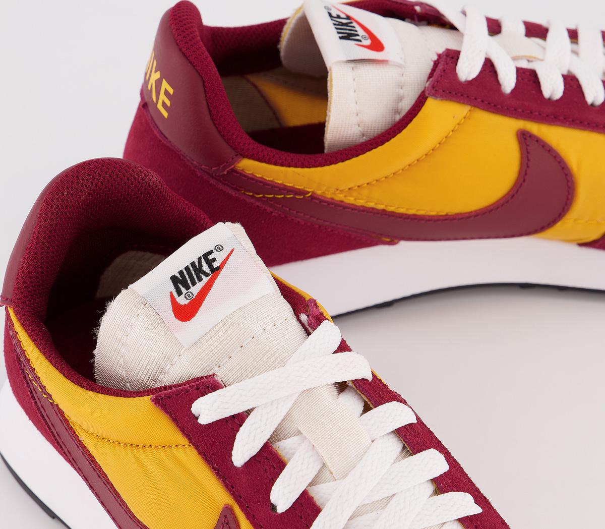 nike tailwind 79 university gold