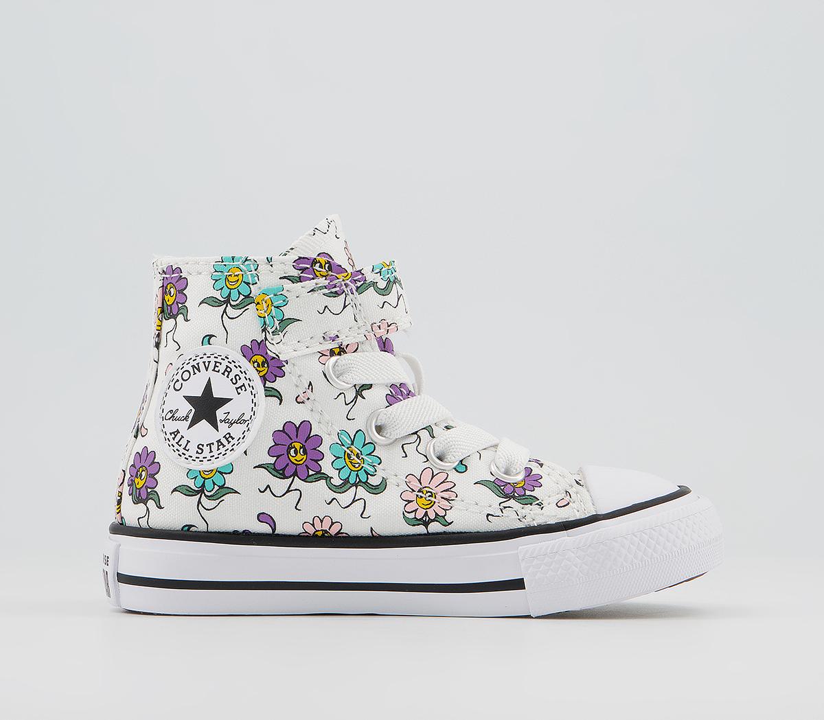 White converse deals with floral tongue