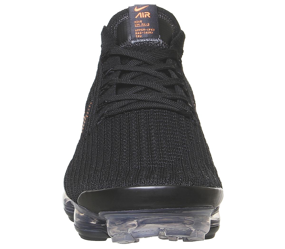 black vapormax orange sole