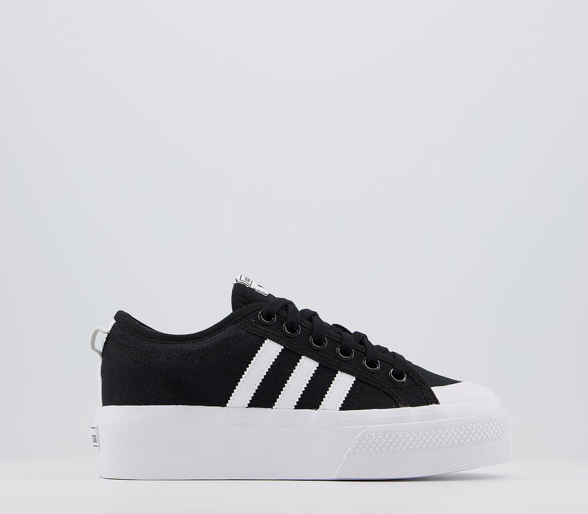 Black and store white platform trainers