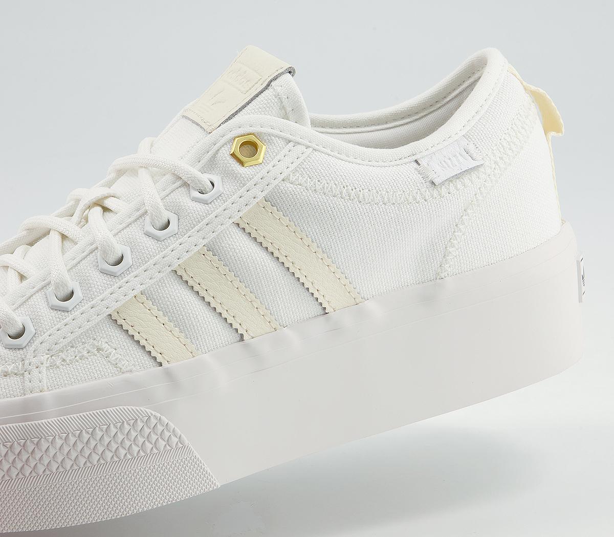 cream platform trainers