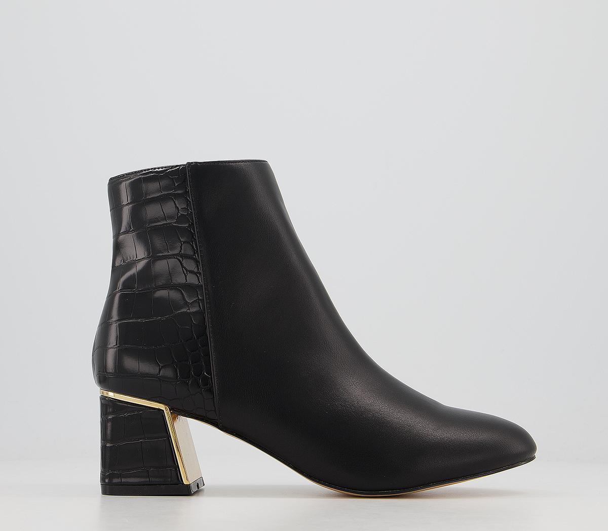 Black booties with gold best sale