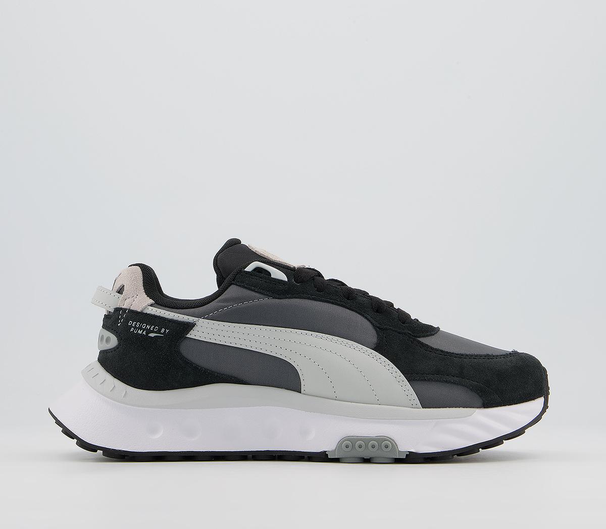 puma wild rider trainers in black and white