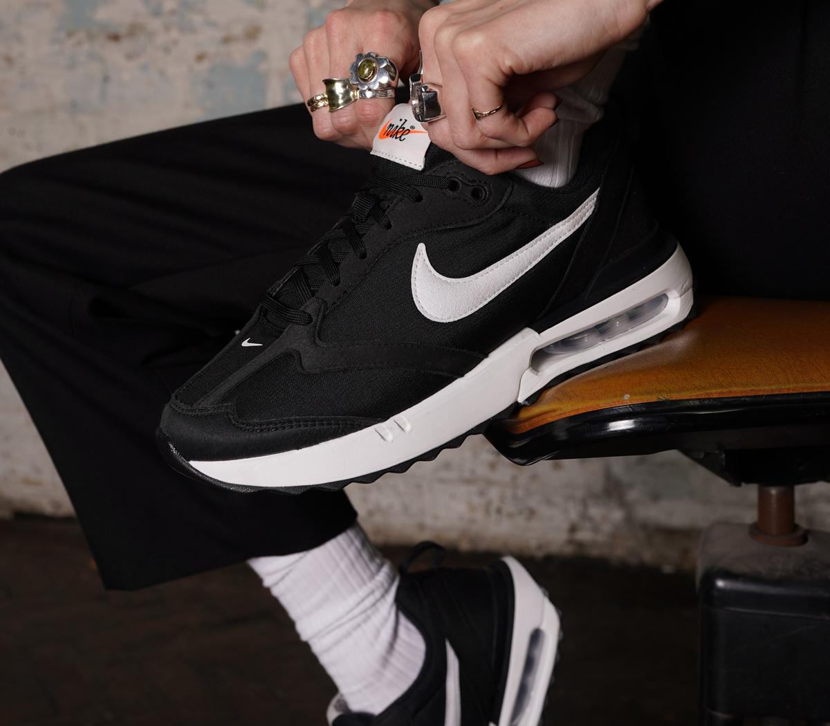 nike air black and white trainers