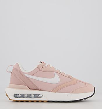 office pink nike trainers