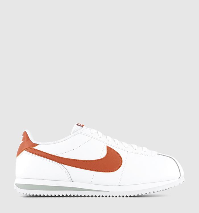 Nike cortez black and sales orange