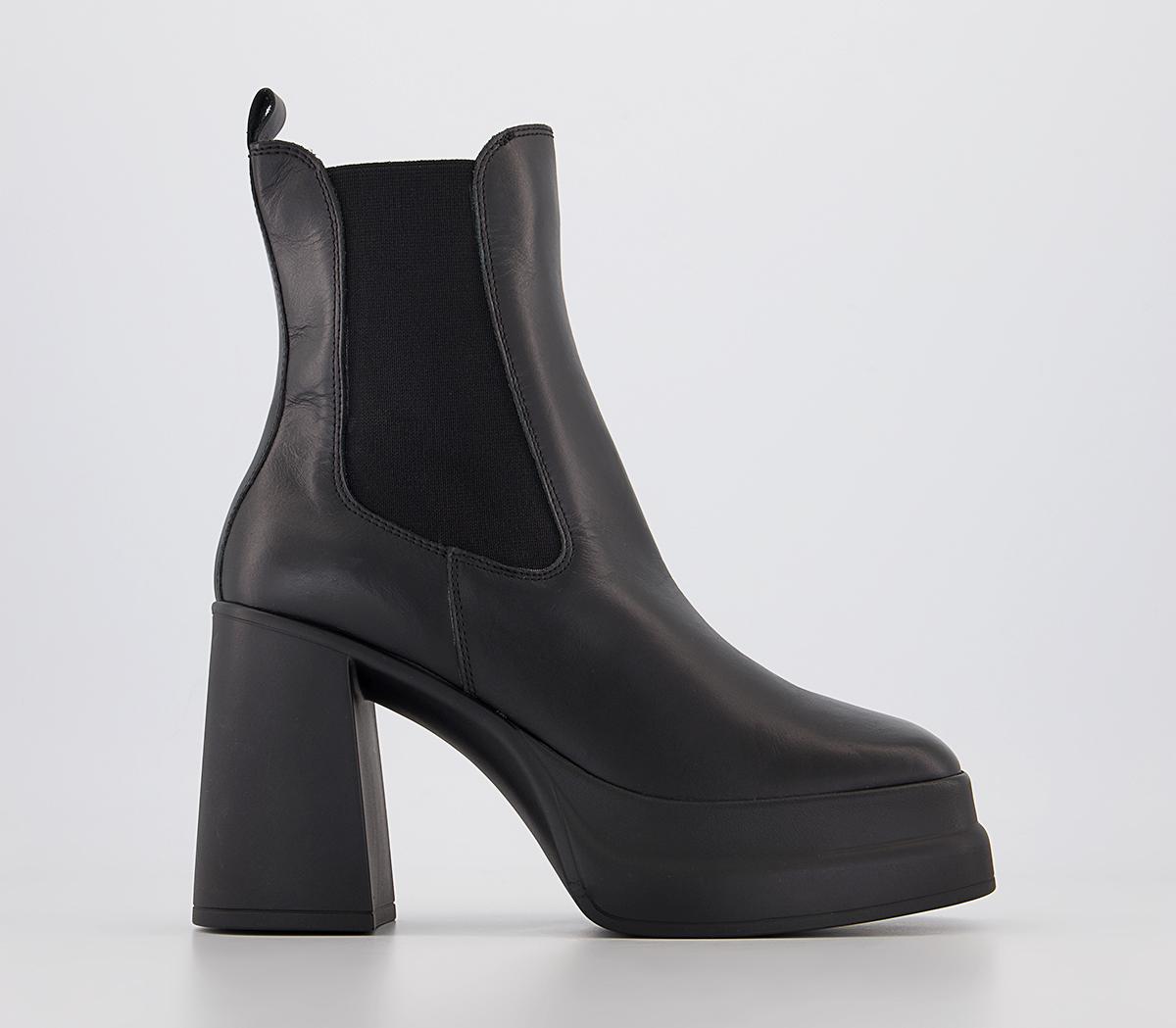 Buy Black Plain Adela High Heel Ankle Boots by OROH Online at Aza Fashions.