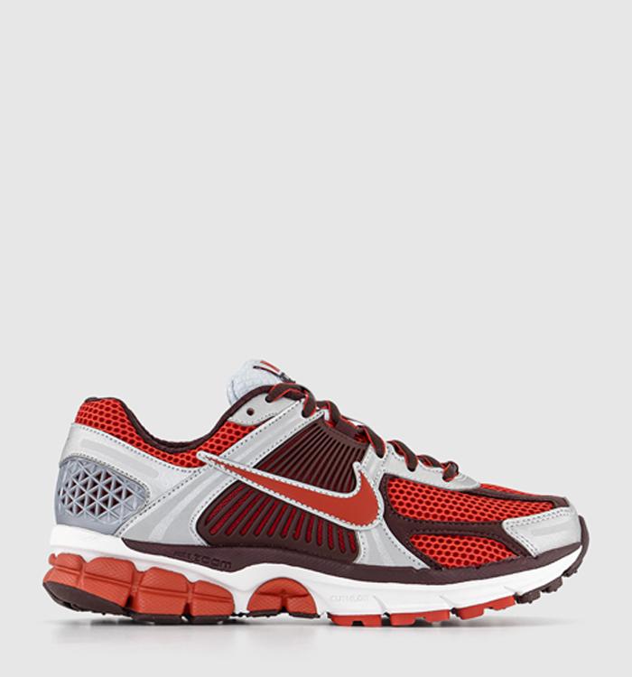 Red kids nike online trainers