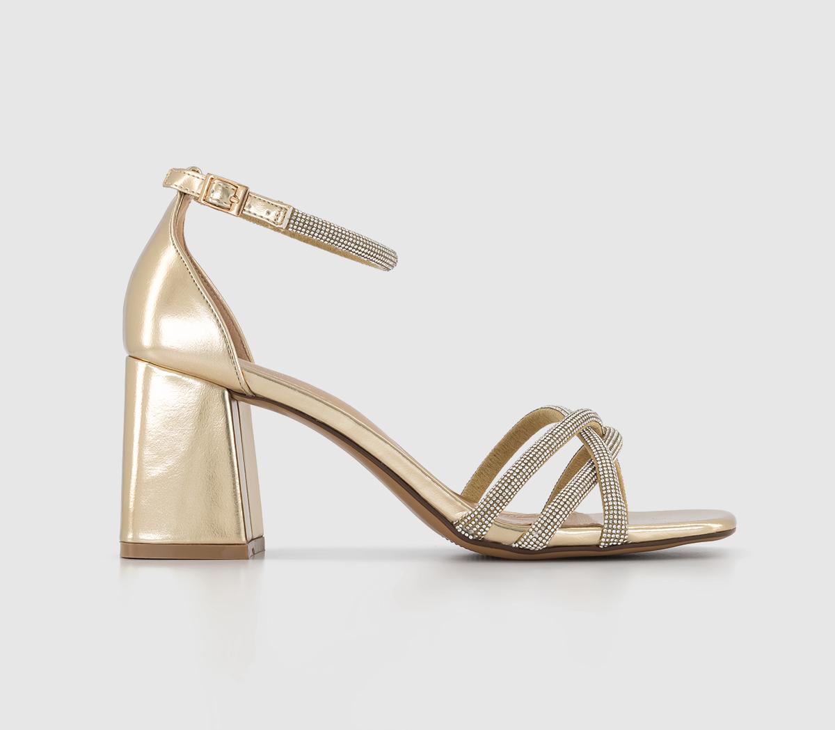 Gold sparkly heeled store sandals