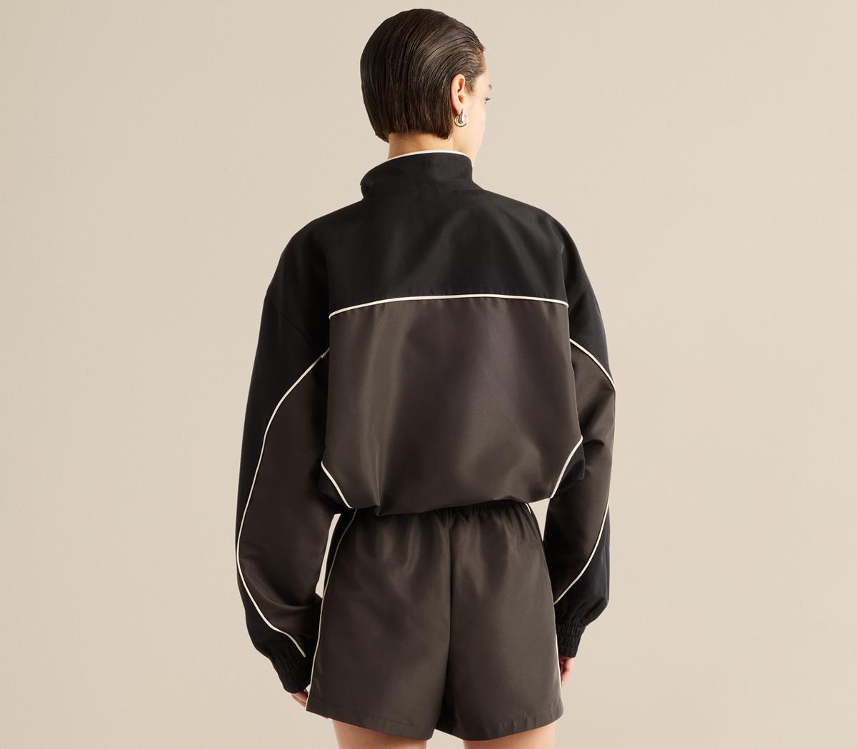 New BalanceTrackside Woven JacketBlack Cement