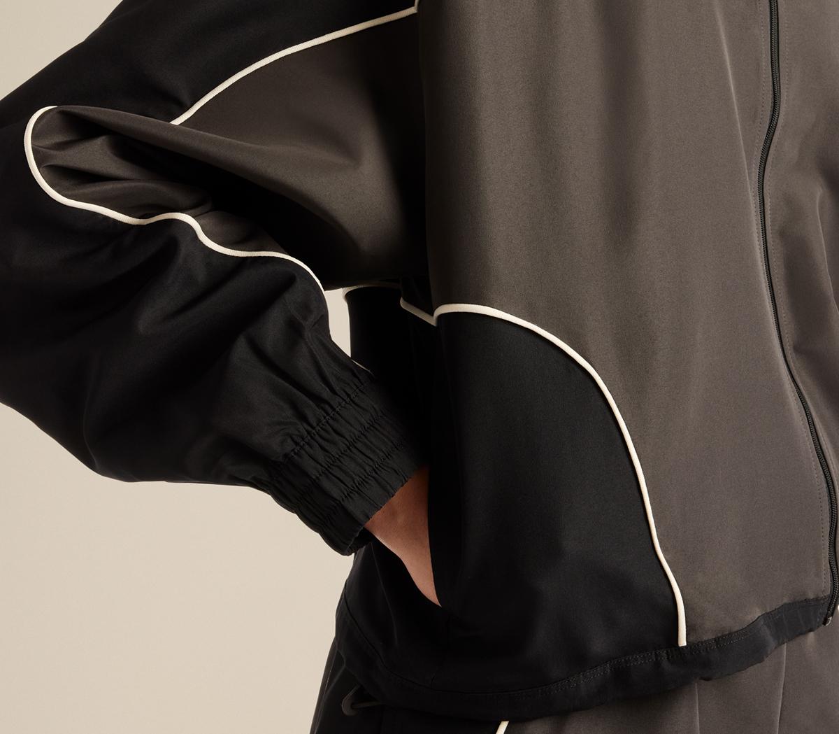 New BalanceTrackside Woven JacketBlack Cement