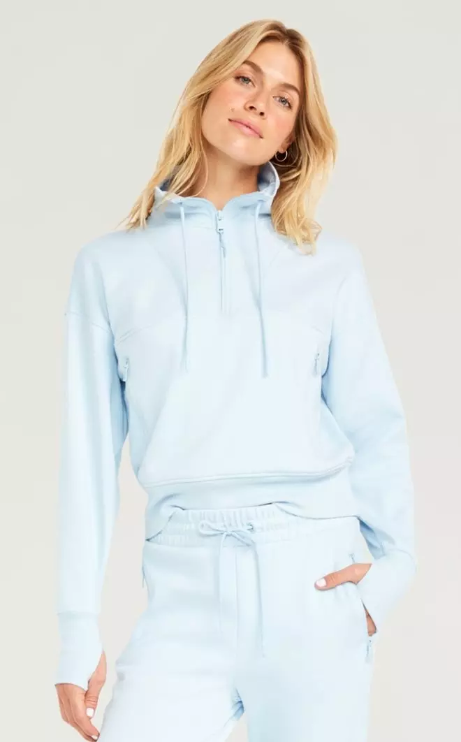 A female model wears a Dynamic Fleece 1/2-Zip Sweatshirt