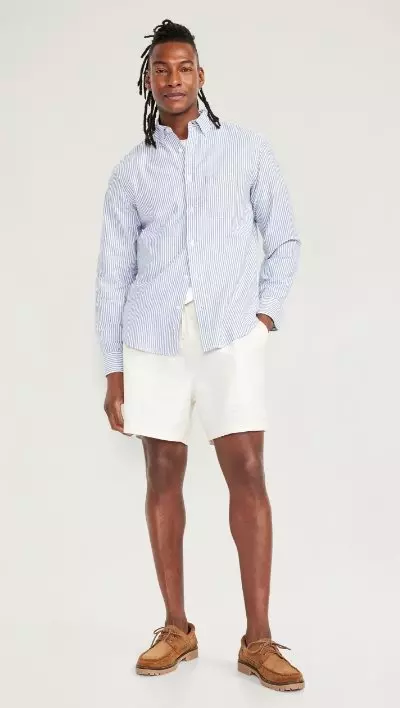 A male model wears a pair of white Pull-On Twill Jogger Shorts