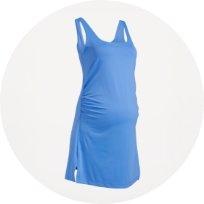 Image features maternity sleeveless powersoft mini skort dress.