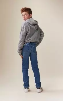 A model wearing original taper built-in flex jeans