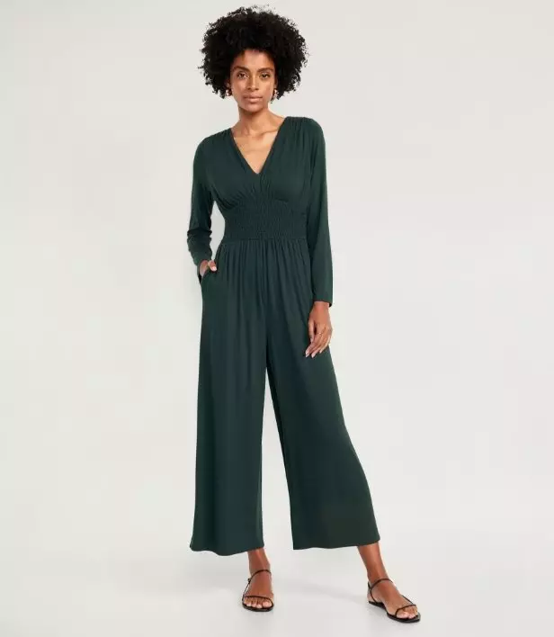 A long sleeve dark green stretchy pants romper.