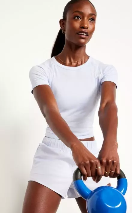 A female model wears Fitted Seamless T-Shirt