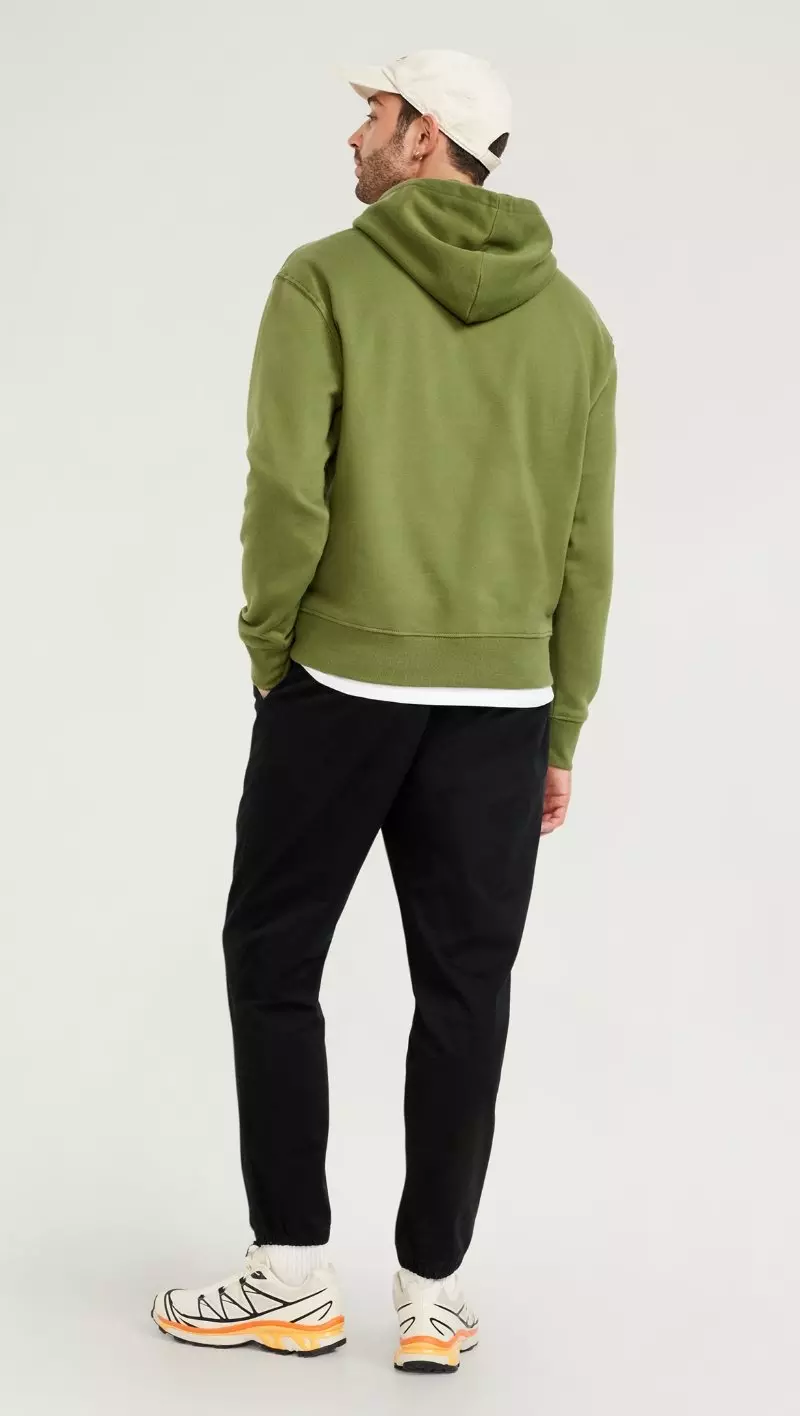 A dark color jogger pant with drawstring adjustment.